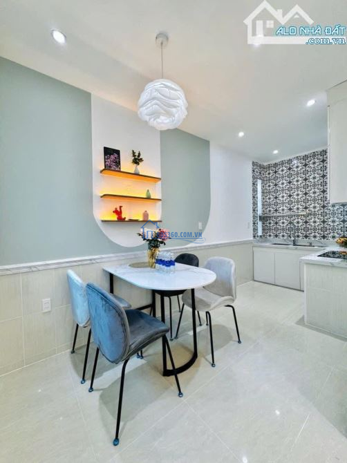 TÂB BÌNH Nguyễn Hồng Đào(cạnh rạp phim Galaxy)61,4m2-2tỷ18-3tầng-4pn.SHR dòng tiền 20tr