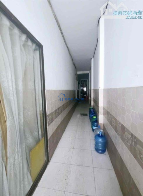 TÒA CĂN HỘ NGŨ HÀNH SƠN-NGAY ĐẠI HỌC KINH TẾ -150M2 - 4 TẦNG-THANG MÁY-DT:80 TR/TH-14 TỶ