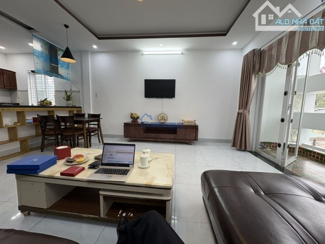 TÒA CĂN HỘ NGŨ HÀNH SƠN-NGAY ĐẠI HỌC KINH TẾ -150M2 - 4 TẦNG-THANG MÁY-DT:80 TR/TH-14 TỶ