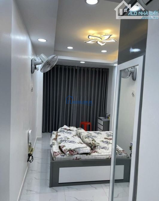 BÁN NHÀ PHÚ NHUẬN HXH SÁT MẶT TIỀN - PHAN XÍCH LONG - 6 TẦNG 7PN 56M2 CHỈ 12,59 TỶ